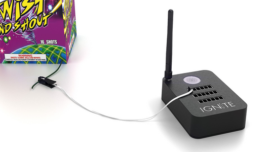 IGNITE Firing System i18 module connected to a clip-on igniter with a firework fuse